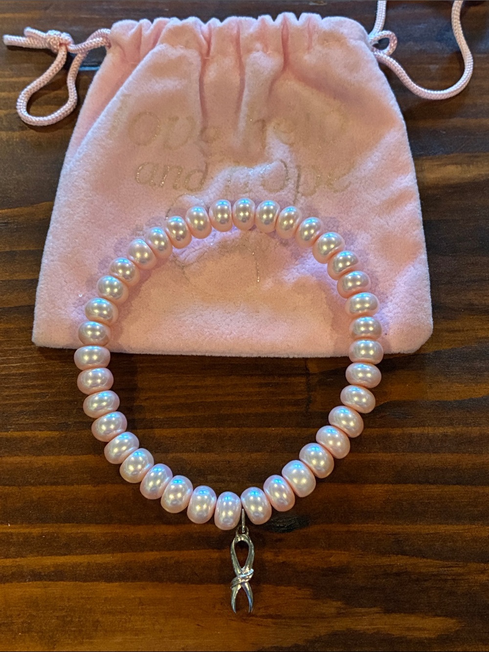 Delicate Pink Faux Pearl Bracelet with Silver Ribbon Charm